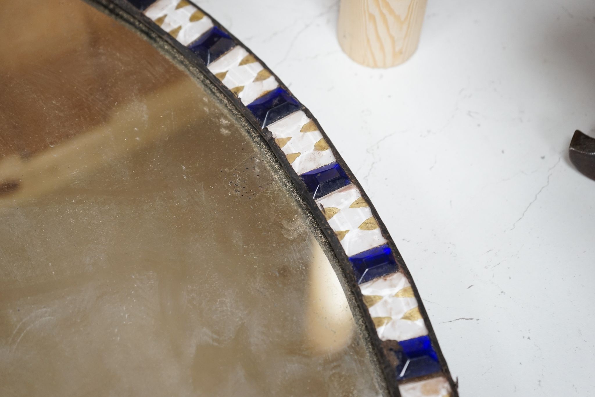 An oval Irish-style wall mirror, 56x41cm